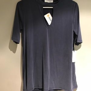 Cute shirt with small peek a boo on chest